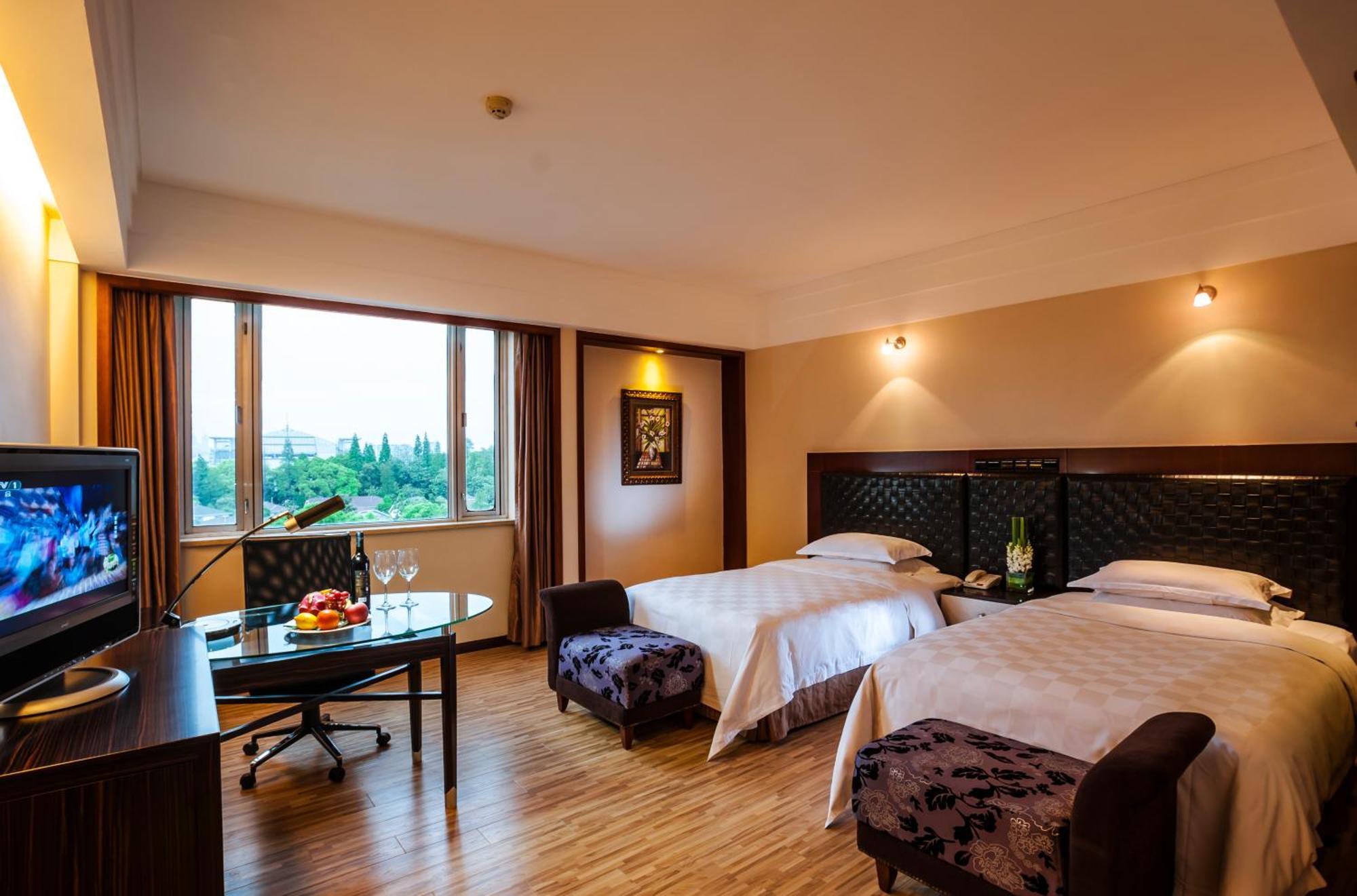 Grand Skylight Gardens Hotel Shanghai Bai Se Road Bagian luar foto