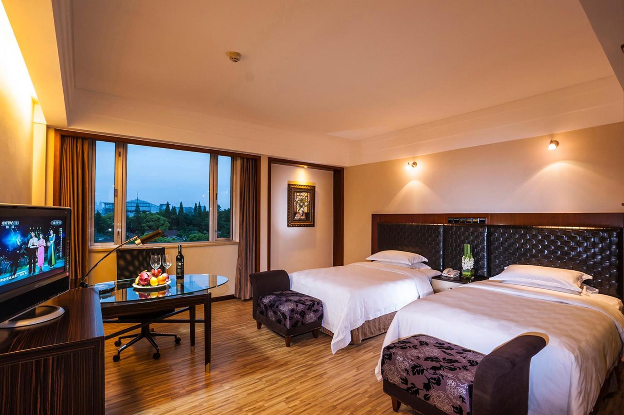 Grand Skylight Gardens Hotel Shanghai Bai Se Road Bagian luar foto